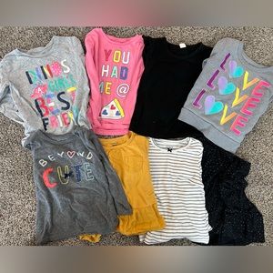8, 2T girl tops, one is sweatshirt.